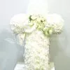 Cruz funeraria de clavel