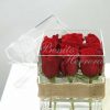 Caja de metacrilato con nueve rosas